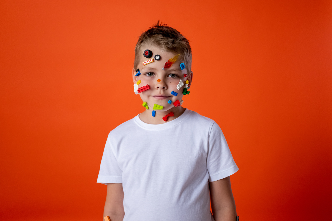 Boy in White Crew Neck T-shirt With Face Paint